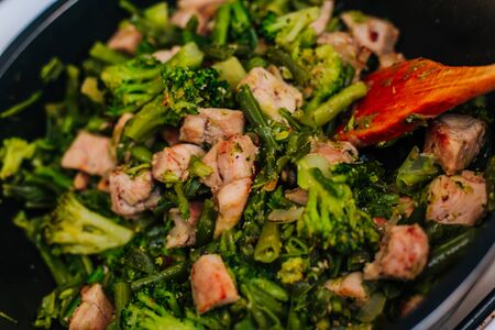 vegetables in a pan with fried chicken.の写真素材