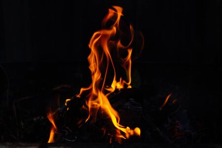 Flames on a dark background.