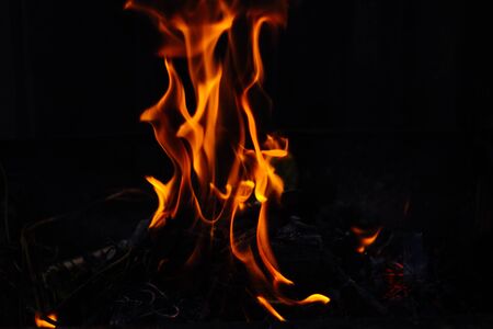 Flames on a dark background.の写真素材