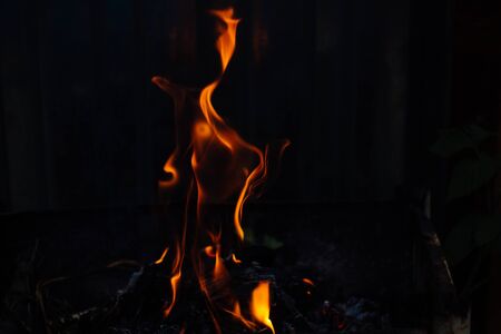 Flames on a dark background.の写真素材