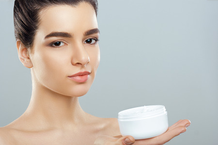 Beautiful Young Woman with Clean Fresh Skin look away. Girl beauty face care. Facial  treatment   . Cosmetology, beauty  and spa.の写真素材