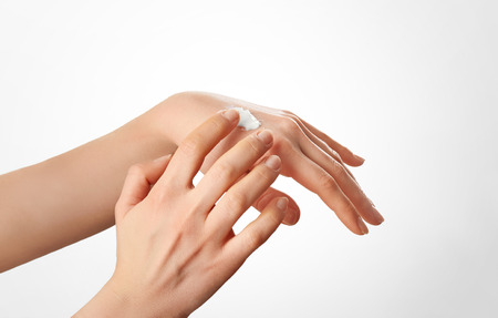 Healthy Hands.Female applying moisturizer to her Hands after bath.Skincare conceptの写真素材