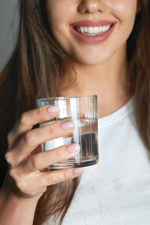 Healthy Lifestyle. Portrait Of Happy Smiling Young Woman With Glass Of Fresh Water. Healthcare....