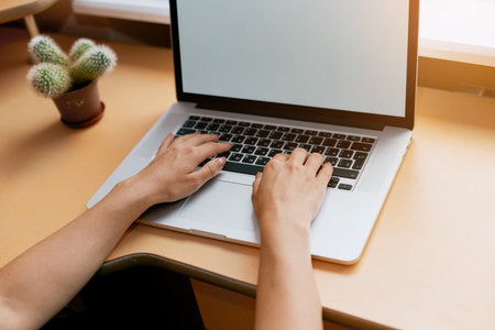 Woman hands typing on laptop keyboard at the office, Woman worker and business concept