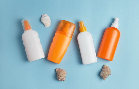 Sun cream, cream, sunscreen bottle, sun cream, lotion bottle, seashells. Beach flat lay accessories....
