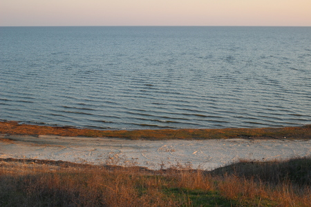 The sea in the light of the setting sunの写真素材