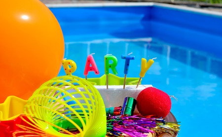 Party decorations on the swimming pool backgroundの写真素材