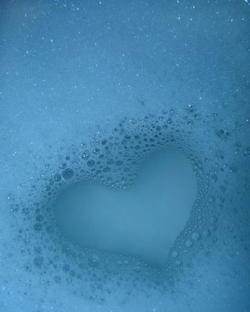  heart of foam bubbles of bath in the water                      の写真素材