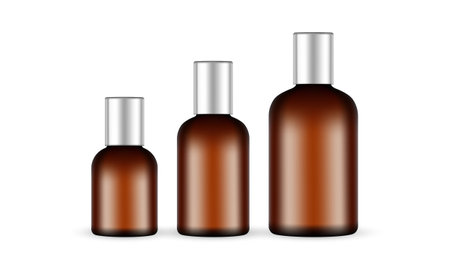 Set of Amber Cylinder Bottles for Cosmetic Packaging, Isolated on White Background. vector illustrationのイラスト素材