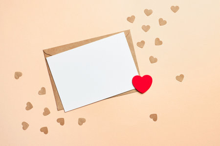 Valentines day card mockup with envelope and hearts on paper backgroundの写真素材