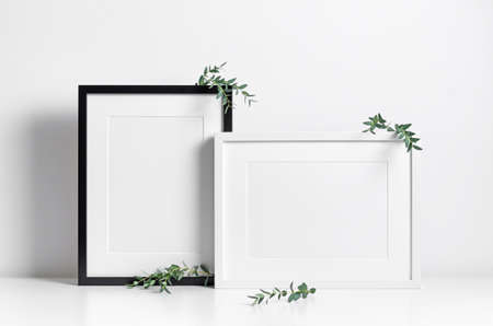 Artwork frames mockup in minimalistic interior, blank frames with copy space