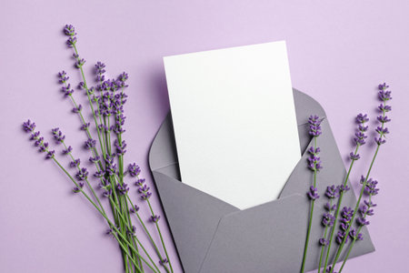 Blank invitation card mockup with envelope and lavender flowers, blank card mock up with copy spaceの写真素材