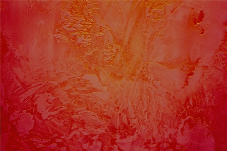 Decorative plaster in red and yellow colors. In the center there are golden shades, red, scarlet, crimson on the edges. Large, rough strokes.の写真素材