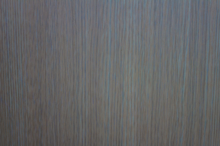 Light surface with gray and beige shades. Fine vertical stripes. Imitation of wood.の写真素材