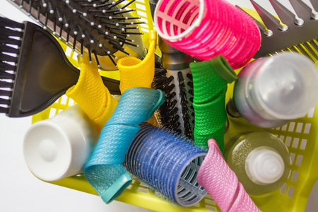 A set of hair care products, styling at home. Change your image, make a haircut with your own hands. View from above.の写真素材