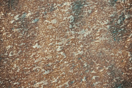 On a brown background, white fragments, abstraction. Vignetting, side lighting.