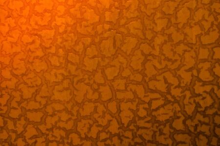 Decoration, interior detail, yellow background with brown cracks, lines. Warm toning.の写真素材