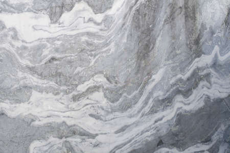 Extraction of marble, mining. Natural texture, gray tones. Wavy lines, abstraction.の写真素材