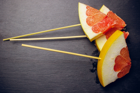 citrus isolated pomelo fruit fresh skewer pieceの写真素材