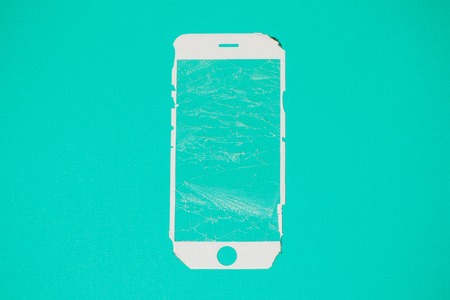 Modern mobile smartphone with broken screen colorの写真素材