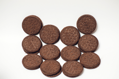chocolate cookies stacked served milk brown snackの写真素材