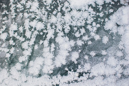 Abstract ice pattern on winter glass whiteの写真素材