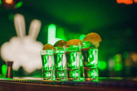 Gold Mexican tequila with lime and salt, selective focusの写真素材