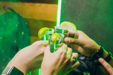 Gold Mexican tequila with lime and saltの写真素材