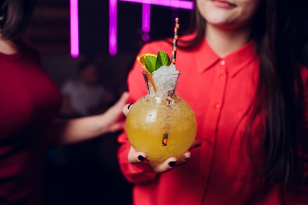 Barman at work, preparing cocktails. Serving pina colada. concept about service and beverages. clubの写真素材