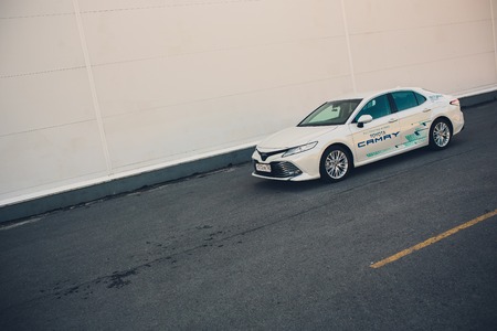 UFA, RUSSIA - 11 August 2018: Brand new white Toyota camry 2018 parkedのeditorial素材
