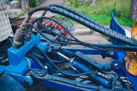 Production of tractors, parts tractor and also instruments onveyor assembly stage the body tractor at factory.の写真素材