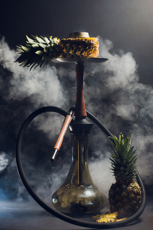 Hookah hot coals on shisha bowl with black background. Stylish oriental shisha. Shisha Conceptの写真素材