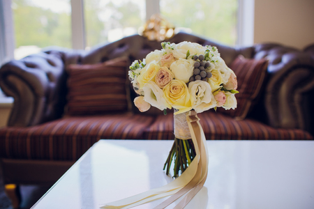 A very nicely decorated wedding table with plates and serviettesの写真素材