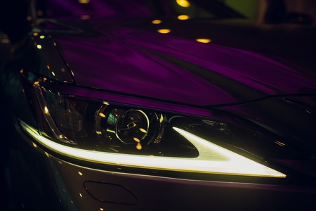 headlight of modern prestigious car close upの写真素材