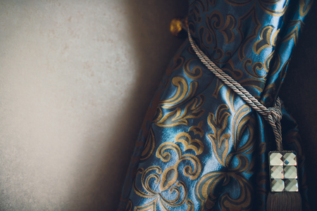 Holder for room curtains. Fragment photo curtain, interior detail, curtain detail close upの写真素材