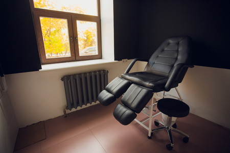 Vintage black Couch chair in modern living roomの写真素材