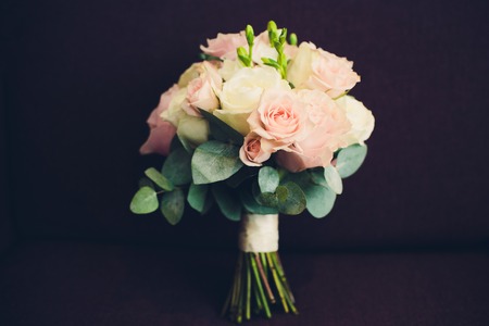 beautiful wedding bouquet of white and pink roses on black backgroundの写真素材