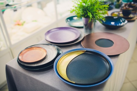 Stack of bowls in various shapes. Many colorful Sell at the marketの写真素材