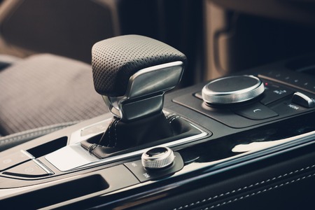 Modern car interior, gearstick close up photoの写真素材