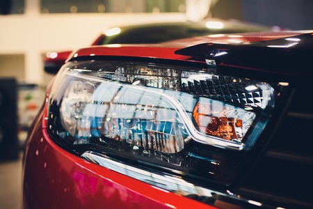 Close up detail on one of the LED headlights modern carの写真素材
