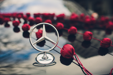 Ufa, Russia, Mercedes, 5 July, 2018 A closeup of a hood ornament on a new black Mercedes-Benz vehicle .のeditorial素材
