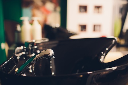 sink for washing hair view of luxury beauty salon blackの写真素材