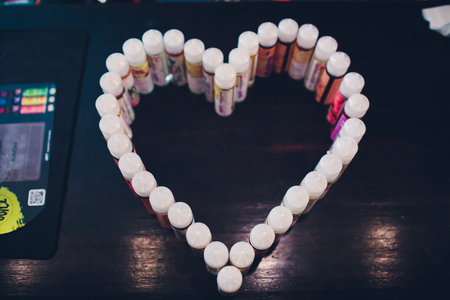 Ufa, Russia, South Vape Shop, 5 November, 2018: E-liquid e-juice High vape for electronic cigarette vaping device , on counter in smoke vapor in vape bar in bottles.のeditorial素材