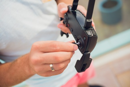Remote Control Drone Hobby Leisure Entertainment Technology Innovation Concept. installation of the joystickの写真素材