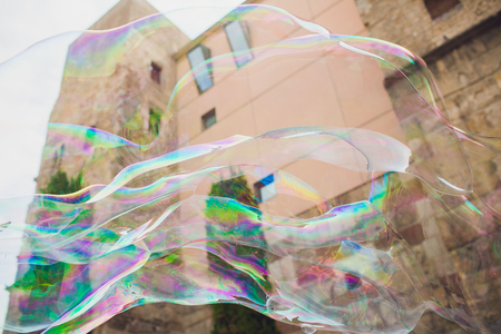 Soap bubbles against the city hall. Barselona.