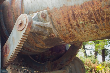Metallic Rusty industrial machine parts closeup photo.の写真素材