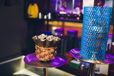 Shisha With Fruit Bowl With Colorful Smoke In Hookah Bar Closeup.