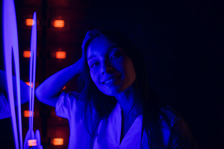 Fashion portrait of young elegant woman. Colored backgroundの写真素材