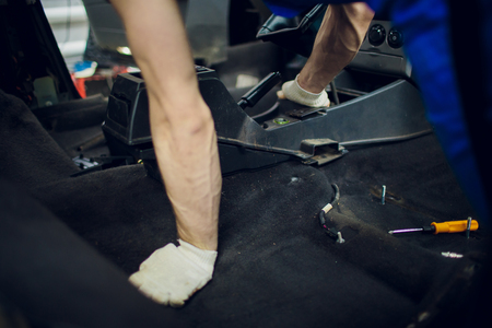 close up part of a car automatic gear lever, gear shift, dismantling for maintenance in garageの写真素材