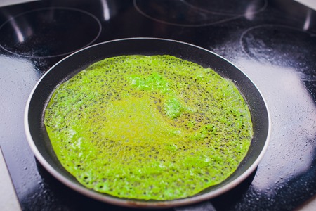 flour green dye cooking frying pan